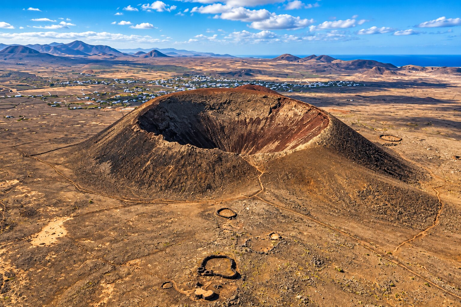 Calderón Hondo volcanic crater overlooking Lajares in northern Fuerteventura