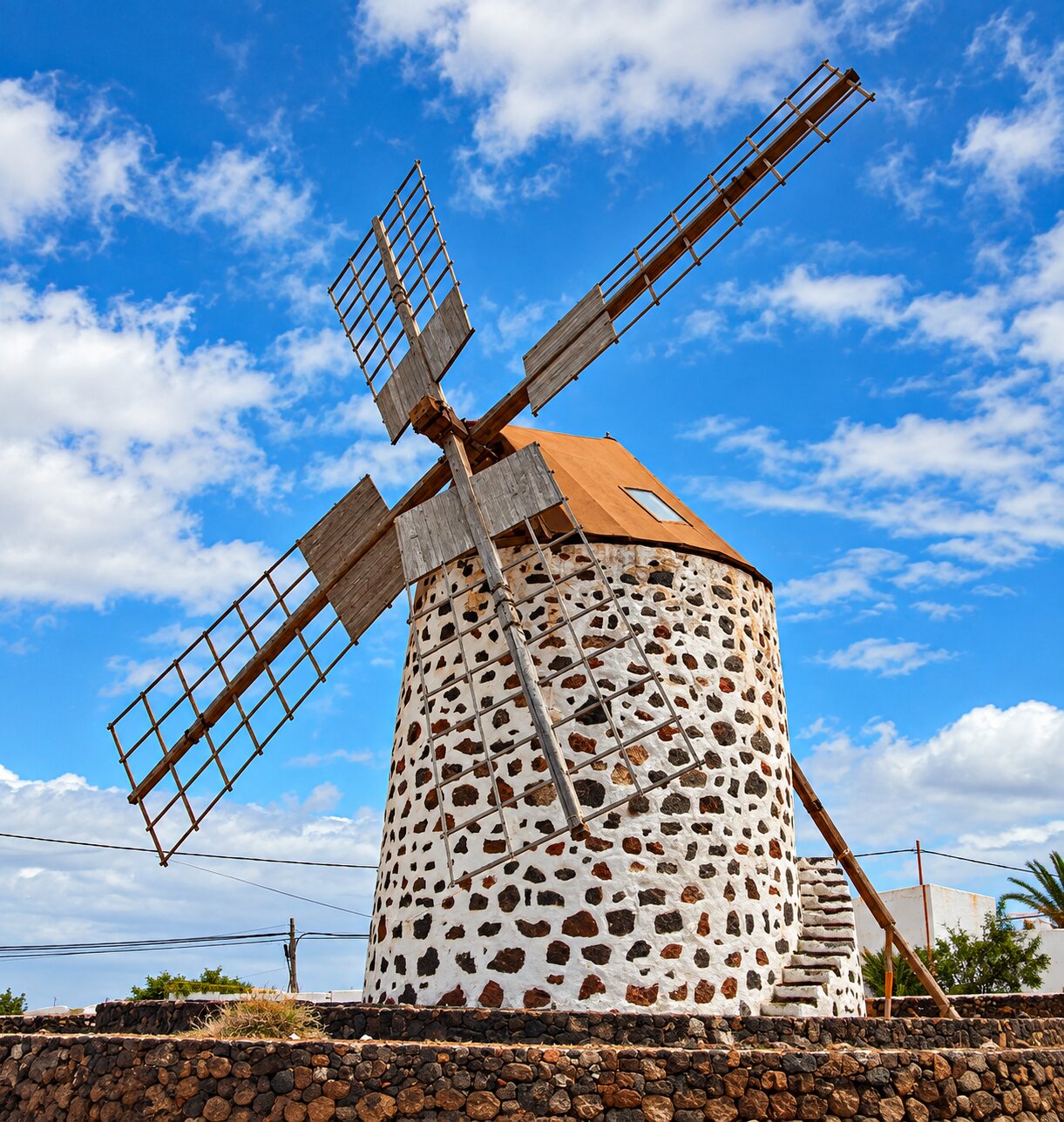 Traditional stone windmill in Lajares auf Fuerteventura under a blue sky